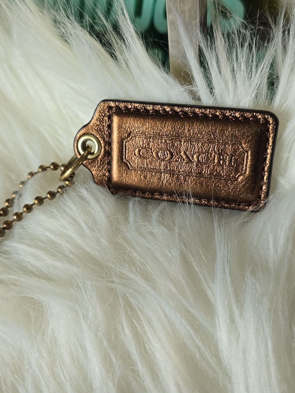 Coach Metallic Bronze Hangtag With Brass Hardware